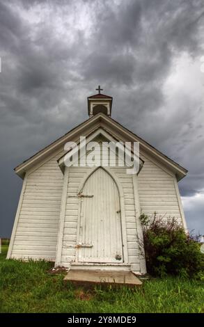 Storm Clouds Saskatchewan with country church at sunset Stock Photo - Alamy