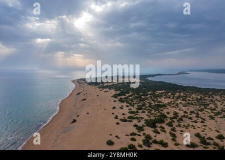 Aerial drone view over sand dunes close to Lake Korission. It is located in the southern part of Greek island of Corfu, Greece. Stock Photo