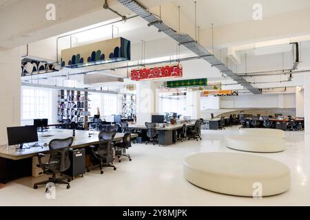 Interior of Mother agency office space inside the Biscuit Building, formerly Lipton Tea Warehouse, Shoreditch, London, England Stock Photo