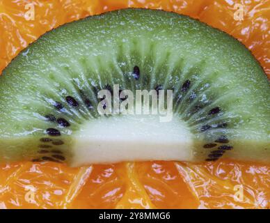 Macro Close Up Fruit Kiwi seeds colorful green Stock Photo