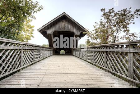 Wooden Covered Bridge Guelph Ontario over eramosa river Stock Photo