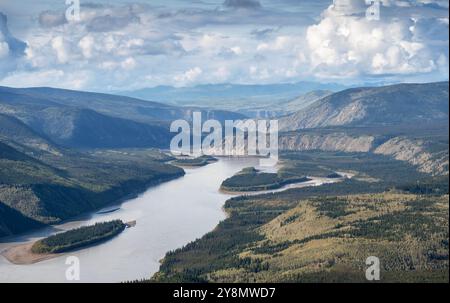 Evening overview of the Yukon River as seen from the Midnight Dome in Dawson City, Yukon, Canada Stock Photo