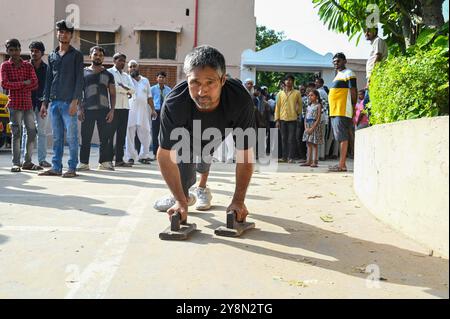 GURUGRAM, INDIA - OCTOBER 5: 52-year-old Balbir Singh physically challenged showing their inked finger after cast her vote for Haryana Assembly Election at Shiv Public School Sohna, on October 5, 2024 in Gurugram, India. A total of 1,031 candidates are contesting in all 90 assembly constituencies, and 20,632 polling booths have been set up for voting. A total of 2, 03, 54,350 voters in the state will be able to exercise their rights in the 15th Haryana Legislative Assembly Elections. (Photo by Parveen Kumar/Hindustan Times/Sipa USA ) Stock Photo