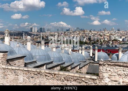 View over Istanbul through the domes of the Suleymaniye Mosque Complex. Stock Photo