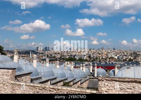 View over Istanbul through the domes of the Suleymaniye Mosque Complex. Stock Photo