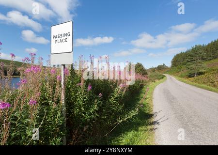 Loch Craggie, Scotland. Picturesque, view of the A837 single track road, with Loch Craggie on the left of the image. Stock Photo