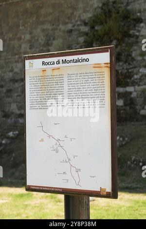 An information board detailing the history and layout of the medieval Fortress of Rocca di Montalcino in the Tuscany region of Montalcino, Italy. Stock Photo