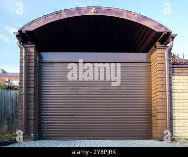 Rolling overhead gates garage canopies Stock Photo