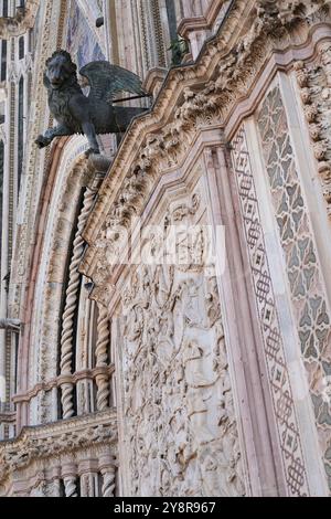 Orvieto Cathedral or Duomo is a large 14th Century Roman Catholic cathedral dedicated to the Assumption of the Virgin Mary Stock Photo