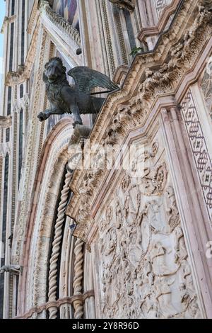 Orvieto Cathedral or Duomo is a large 14th Century Roman Catholic cathedral dedicated to the Assumption of the Virgin Mary Stock Photo