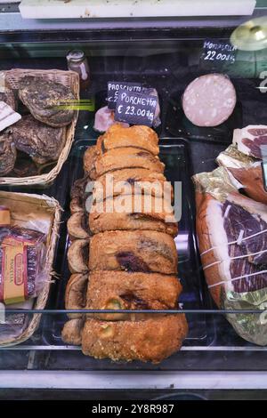 The “Antica Bottega Roticiani” is a traditional butcher in Orvieto, Italy.  Amazing porchetta sandwiches and other cured meats. Stock Photo