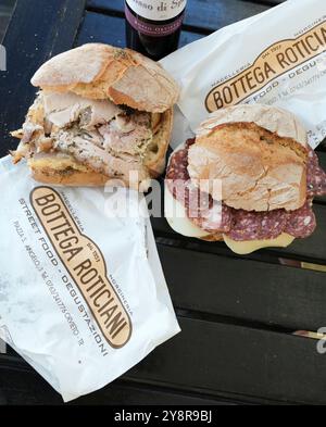 The “Antica Bottega Roticiani” is a traditional butcher in Orvieto, Italy.  Amazing porchetta sandwiches and other cured meats. Stock Photo