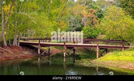 Bridge to Island over part of a lake Stock Photo