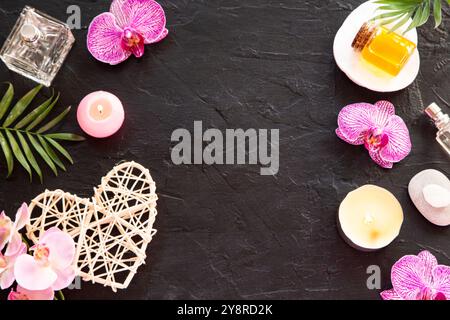 Beauty arrangement with an orchid on black background Stock Photo