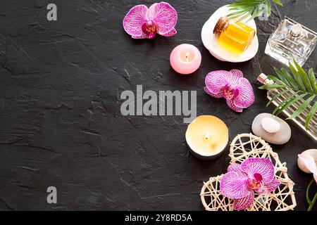 Beauty arrangement with an orchid on black background Stock Photo