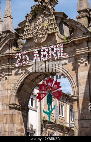 Decoration at a town gate in Braga for the festivities of the carnations revolution in Portugal Stock Photo