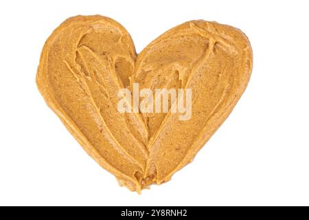 Homemade peanut butter and patterned sandwich isolated on white background. The concept of love for nuts. Favorite breakfast. Nuts in the shape of a Stock Photo