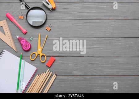 Different stationery on grey wooden background. Top view Stock Photo