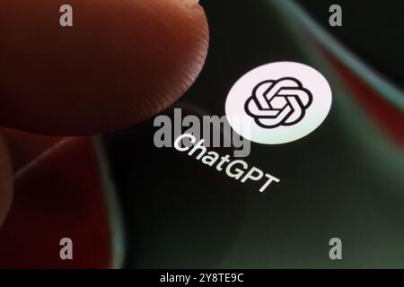 ChatGPT app icon on a smartphone screen. Highlighting the mobile AI assistant application, focusing on text generation, conversation, and advanced lan Stock Photo