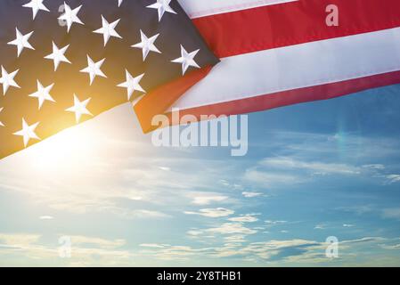 Patriotic US flag flat lay background on sky background with copyspace Stock Photo