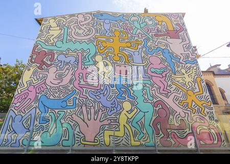 Pisa, Italy, 29 June 2023: Tuttomondo (All World) is the last mural created by American artist Keith Haring in 1989 before his death, Europe Stock Photo