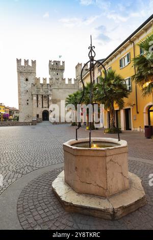 Sirmione, Italy, June 2022: Sirmione castle on Garda lake. Scenic mediaeval building on the water, Europe Stock Photo