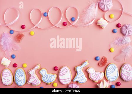 Homemade Easter cookies on pink background flat top view Stock Photo