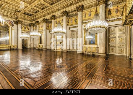 Turin, Italy, 17 november 2023: baroque ballroom interior in Royal Palace, 1842. Luxury marble, antique chandelier, classic floor, Europe Stock Photo