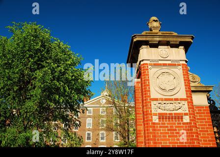 The crest of Brown University, an Ivy League college in Providence, Rhode Island, stands on the brick Van Winkle gate, the main entrance to the campus Stock Photo