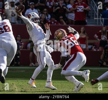 The San Francisco 49ers' Leonard Floyd (56) and Nick Bosa (97 ...