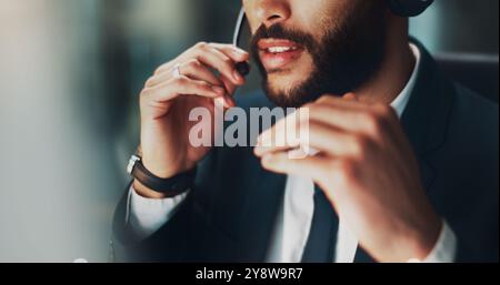 Call center, talking and mouth of man in office at night for international technical support consultation online. Headset, tech and customer service Stock Photo