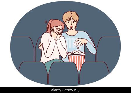 Guy and girl are watching horror movie in cinema and eating popcorn enjoying films about vampires. Fearful woman closes eyes with hands sitting in cinema near man watching horror movie with interest Stock Vector