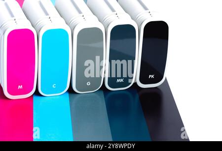 Cartridges HP for wide format plotter on white background. Bright creative concept minimal Stock Photo