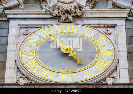 Madrid, Spain - September 26, 2024: Close-up of the clock in the architectural capital in the Royal Palace. Stock Photo