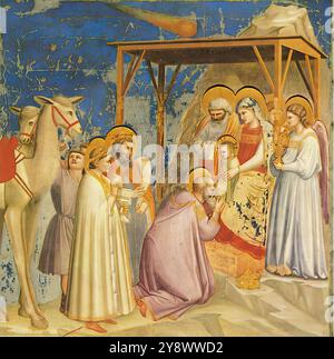 GIOTTO di Bondone (b. 1267, Vespignano, d. 1337, Firenze)  No. 18 Scenes from the Life of Christ: 2. Adoration of the Magi 1304-06 Fresco, 200 x 185 cm Cappella Scrovegni (Arena Chapel), Padua  The five scenes on the right wall represent the Nativity, the Adoration of the Magi, the Presentation in the Temple, the Flight into Egypt, and the Massacre of the Innocents.  The well-constructed shed in the first scene reappears in this scene, set at a slightly different angle.       *** Keywords: *************  Author: GIOTTO di Bondone Title: No. 18 Scenes from the Life of Christ: 2. Adoration of th Stock Photo