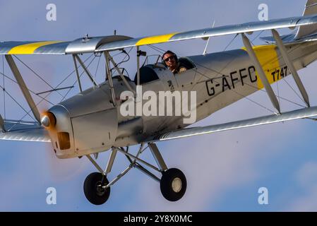 Biplane nostalgic vintage aircraft on display flight Stock Photo - Alamy