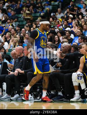 Golden State Warriors guard Gary Payton II (0) shoots next to Denver ...