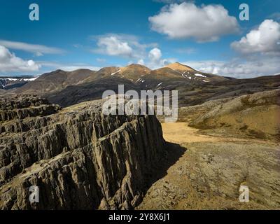 Rock formations of volcanic eruptions and rocky mountains in daytime Stock Photo