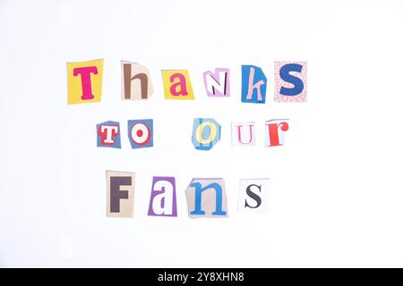 Thank you symbol. Fun cut out newspaper style typescript with words Thanks to our Fans. Isolated on clean white background. Stock Photo