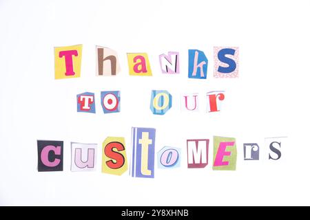 Thank you symbol. Fun cut out newspaper style typescript with words Thanks to our Customers. Isolated on clean white background. Stock Photo