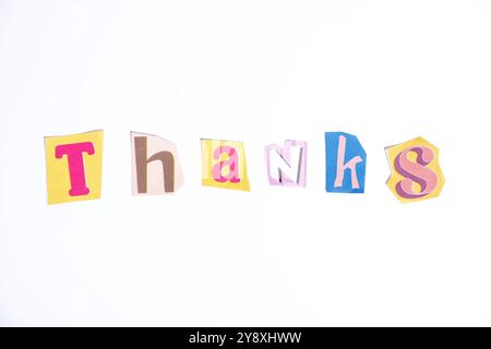 Thank you symbol. Fun cut out newspaper style typescript with word Thanks. Isolated on clean white background. Gratitude and Thank you concept. Stock Photo