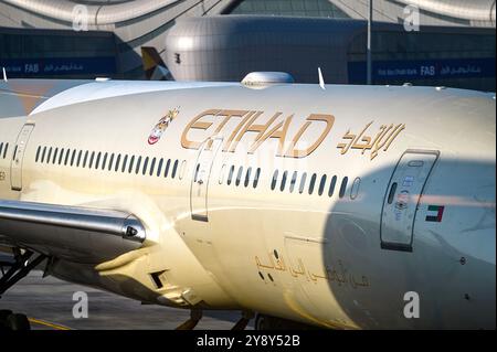 ABU DHABI - SEPT 20: Airplane wearing the livery of Etihad Airways on surface on September 20. 2024 in UAE Stock Photo