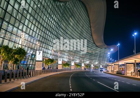 ABU DHABI - SEPT 21: Panoramic view of new Zayed International Airport in the night time in Abu Dhabi on September 21. 2024 in UAE. Stock Photo