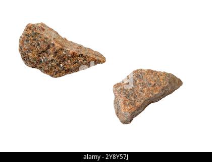 Two pieces of broken falling stones isolated on white Stock Photo