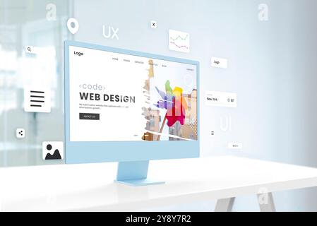 Stylish blue screen sits on an office desk, displaying a vibrant web design page, complemented by surrounding web design modules, reflecting a cutting Stock Photo