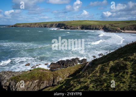 Breaking waves approaching 'Whistling Sands', Lleyn Peninsula, North Wales, UK Stock Photo