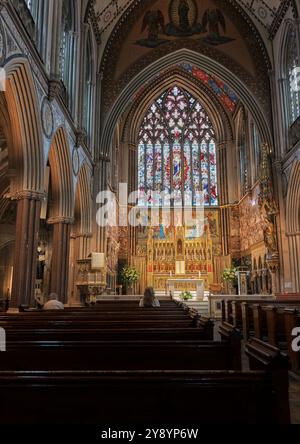 Nave, sanctuary and altar in the catholic christian church of the Immaculate Conception run by the Jesuit priests, Farm Street, Mayfair, London, Engla Stock Photo