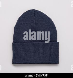Black beanie hat on grey background Stock Photo