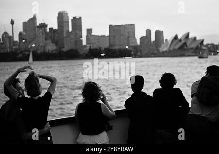 Looking at the view of Sydney Harbour from a ferry boat. Australia. 2000s 2000 HOMER SYKES Stock Photo