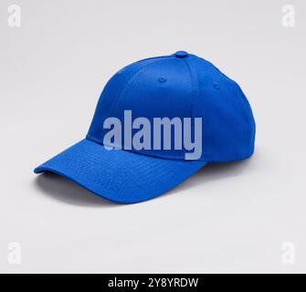 Side view  of GBlue Baseball cap on grey background Stock Photo